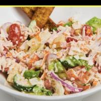 Kani Salad · Romaine lettuce, cherry tomatoes, baby corn, red onion, cucumber.