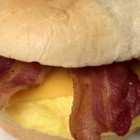 Bacon Egg & Cheese Sandwich On A Roll · A Jumbo Egg cooked to perfection with crispy bacon and melted american cheese on top.