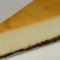Cheesecake Slice · One slice. Choose from plain, strawberry, pineapple, red velvet, or triple-chocolate cheesec...