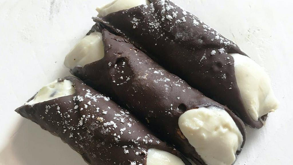 Large Chocolate Cannoli · Crunchy Chocolate Dipped Cannoli shell filled with creamy cannoli filling with chocolate chips inside!!
