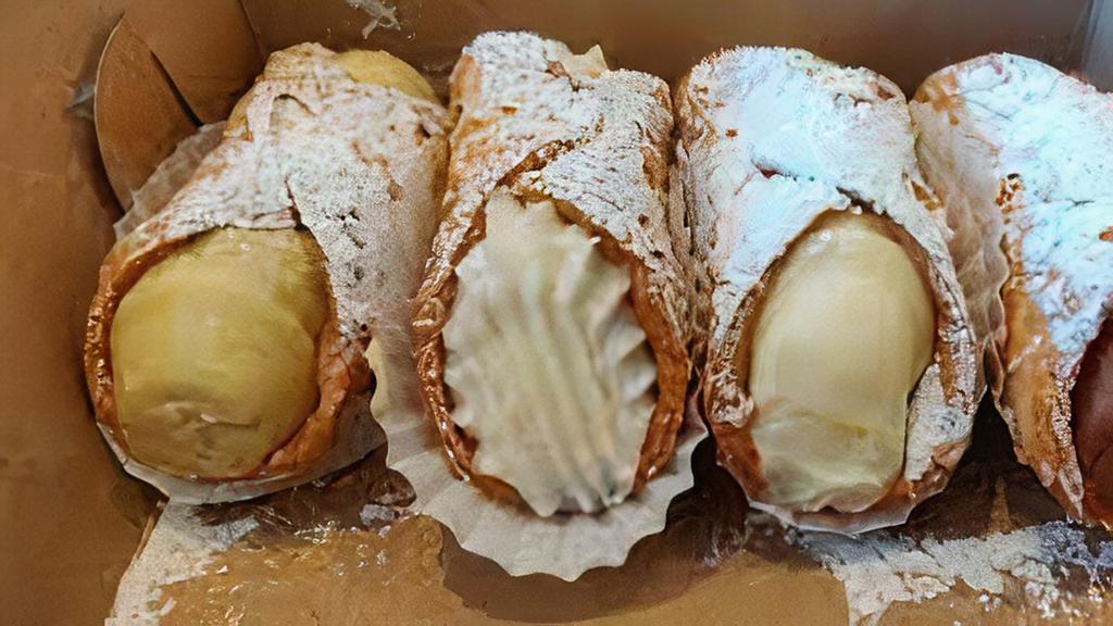 Large Cannoli · Crunchy cannoli shell filled with fresh chocolate chip cannoli filling.