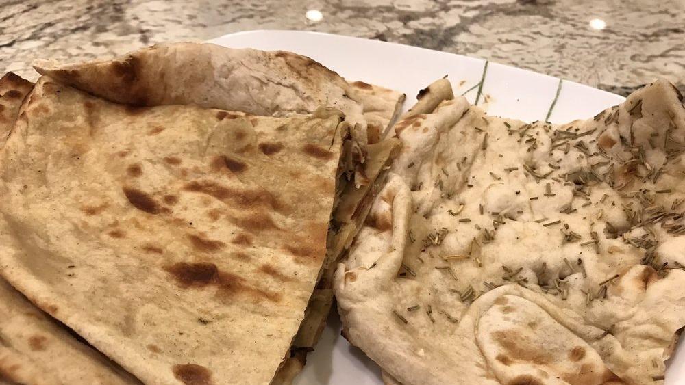 Laccha Paratha · Crispy and flaky unleavened flat bread.