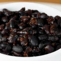 Black Beans · Black Turtle Beans with sofrito made with assorted peppers & Onions