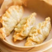 Fried Dumplings (4 Pieces) · Beef and Vegetables.