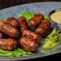 Cocktail Susages · Mini Irish sausages with brew pub mustard