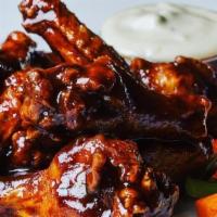 Single Wings (10) · Classic Atomic Wings with your choice of signature sauce all with blue cheese, celery and ca...
