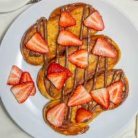 Strawberry Nutella French Toast · Fresh strawberries on top and nutella.