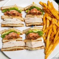 Roasted Turkey Club · Home-roasted turkey, lettuce, tomato, bacon, mayonnaise.