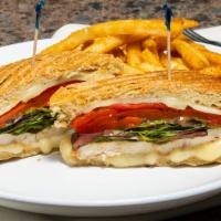California Panini · Grilled chicken, roasted peppers, mozzarella, baby greens, balsamic vinaigrette.