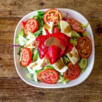 Italian Salad · Mixed greens, tomatoes, cucumbers, fresh Mozzarella, roasted peppers.