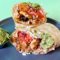 Chili Lime Chicken Burrito · Chili lime chicken burrito with your choice of toppings and sauce.