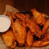 1 Lb. Classic Chicken Wings · 1 lb. of bone-in wings is a minimum of 8. Served with a side of homemade blue cheese dressin...