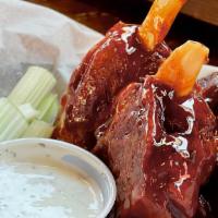 Pig Wings · Pig Wings? Well pigs do fly!!! Over 1 pound of Big Meaty Pork Shanks on the Bone!