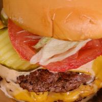 Double Smash Burger With Fries · Served with American cheese, lettuce, tomato, onion, pickles and special sauce and Fries.