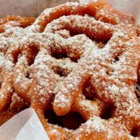 Funnel Cake · Deep-fried sweet batter topped with powdered sugar.