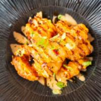 Rock Shrimp Tempura · fried tempura-battered rock shrimp, sriracha mayo*, nitsume
sauce, aonori, scallions