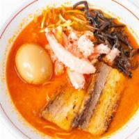 Miso Crab Ramen · House miso crab blend + vegan dashi; slow braised niman ranch pork belly, crab meat, hanjuku...