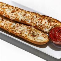 Cheese Bread · French bread smothered in garlic butter, melted mozzarella and sprinkled with Italian season...