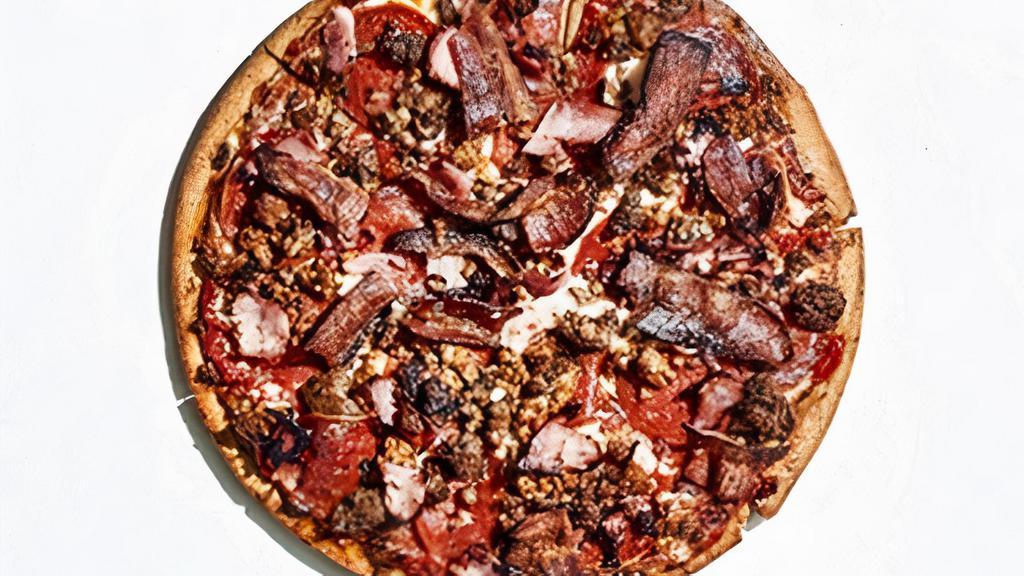 Gluten-Free Mighty Meaty · A carnivorous mix, this pie starts with gluten-free crust (available only in size small) and Mellow Red Sauce covered with mozzarella, pepperoni, Italian sausage, ground beef, honey ham and applewood-smoked bacon.