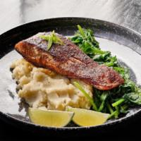 Blackened Center Cut Salmon · cajun rubbed center cut salmon, garlic smashed potatoes, seasonal vegetables