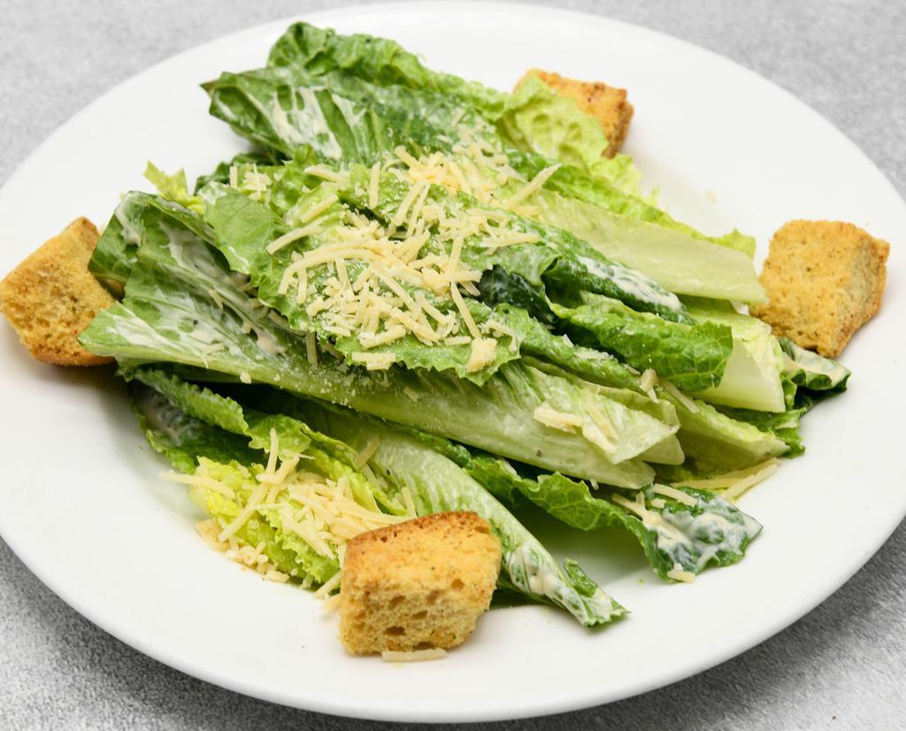 Classic Caesar Salad · Crisp romaine leaves, parmesan, croutons & caesar dressing.