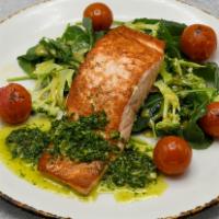 Pan Roasted Salmon · Shaved broccoli & kale slaw, caper herb sauce, blistered tomatoes.