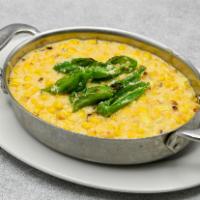 Creamed Corn · Blistered shishito peppers.