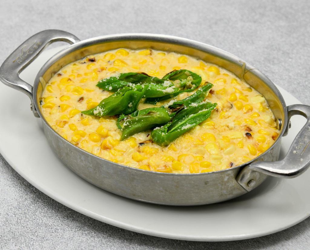 Creamed Corn · Blistered shishito peppers.