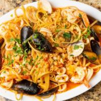 Seafood Pasta · Shrimp, clams, calamari, and marinara with your choice of pasta. Served with pasta.