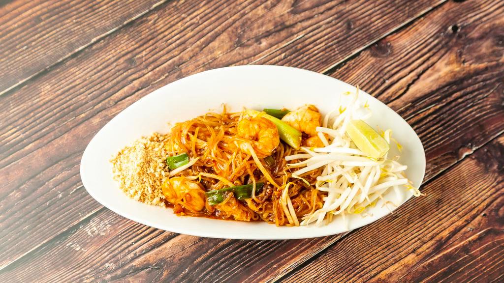 Pad Thai · Vegan/Vegetarian, Gluten free. Thai stick rice noodles with tofu, eggs, chopped radish, chives, bean sprouts, crushed peanuts, and your choice of protein - chicken/tofu/beef/shrimp/vegetable.