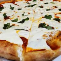 Margherita Specialty Pizza · Basil, fresh mozzarella, and fresh tomatoes.