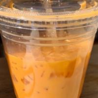 Thai Iced Tea · Brewed with real Thai tea leaves, infused with star anise and cloves, and sweetened condense...