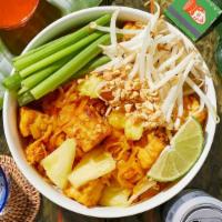 Pineapple Pad Thai · Stir-fried rice noodles with your choice of meat, pineapple, callions, bean sprouts, scrambl...