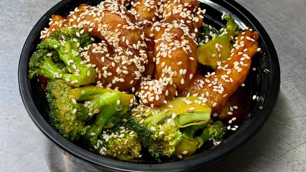 Sesame Chicken · Batter fried chicken cube in a homemade sauce and 
topped with sesame.