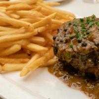 Angus Prime Filet Mignon (8 Oz) · Brandy green peppercorn sauce, with French fries.