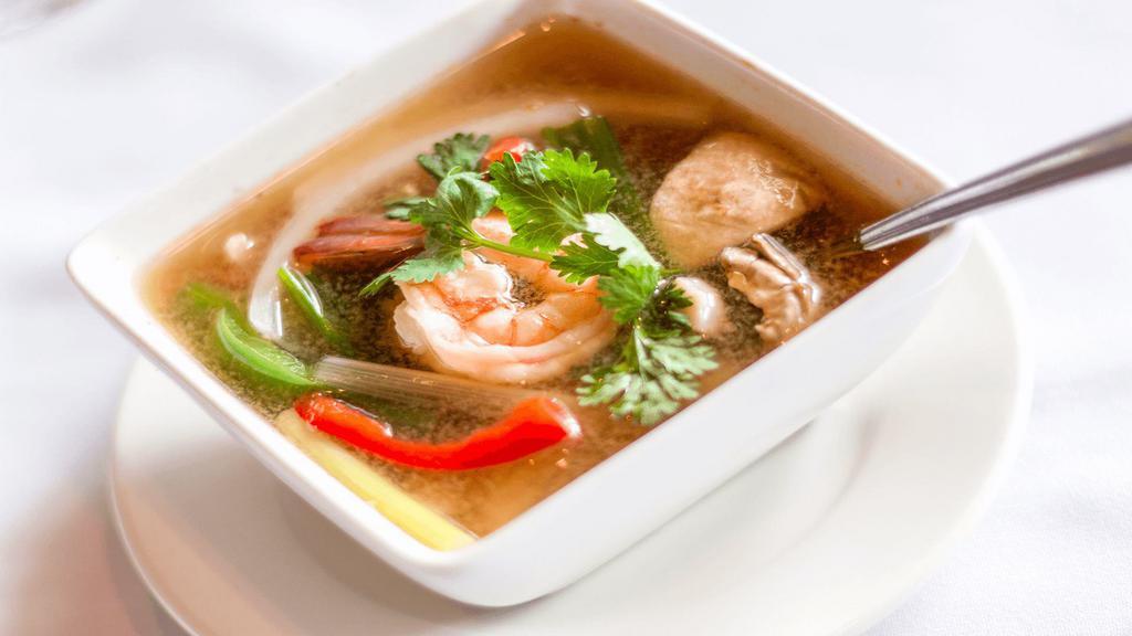 Small Tom Yum Koong (Shrimp) · Hot and sour soup with shrimp, lemongrass, lime juice, mushrooms, bell peppers, onions, scallions, and hot chili paste.