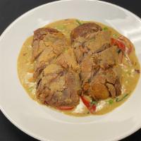 Duck With Green Curry · Crispy boneless duck breast on green curry with avocado, diced carrots, bell peppers, green ...