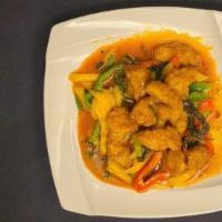 Mango Chicken · Bread chicken sautéed with mango, bell peppers, and Thai basil in sweet and sour mango sauce.