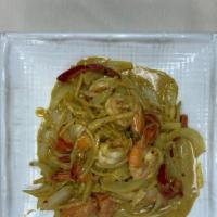 Koong Phuket · Jumbo shrimp sautéed with bell peppers, onions, ginger, bamboo shoots, and tomatoes with cur...
