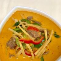 Gang Dang (Red Curry) · Red curry and coconut milk with bamboo shoots, bell peppers, onions, lime leaves, and basil ...
