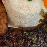 Entrana · Chargrilled skirt steak. Served with beans, rice, salad & sweet plantain