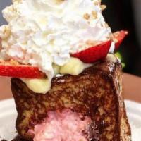 Stuffed Strawberry Cheesecake French Toast · w/ Pastry Creme.