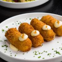 Croquetas · Daily croquettes, seasonal aioli. (Contains dairy, contains gluten). *If you have any severe...