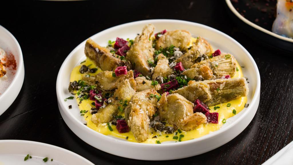 Alcachofas Crujientes · Crispy artichoke hearts, beets, preserved lemon aioli. (Gluten free, vegetarian, contains dairy). *If you have any severe food allergies (I.E. Celiac disease), please contact the restaurant directly for further menu advisement.