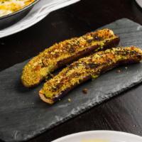 Berenjena · Grilled eggplant, toasted pistachios, pistachio-anchovy aioli. (Contains nuts). *If you have...