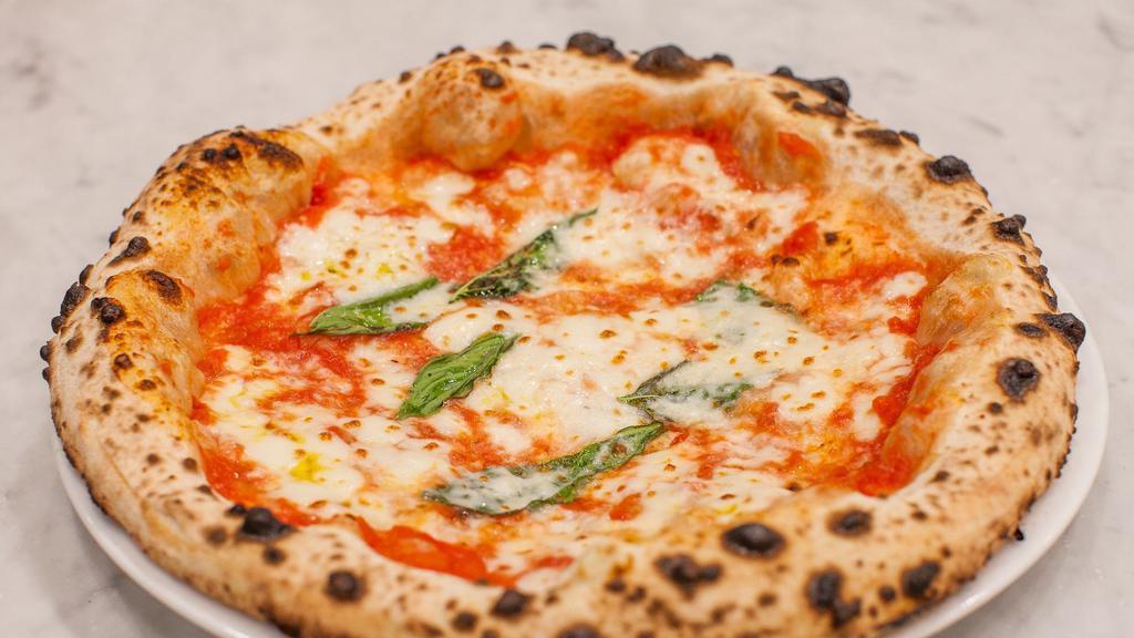 Margherita · San Marzano tomatoes, fresh mozzarella, basil, parmigiano reggiano D.O.P., and extra virgin olive oil.