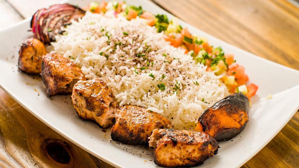 Chicken Kabob (A La Carte) · Boneless pieces of chicken breast marinated in special herbs and spices, broiled on a skewer.