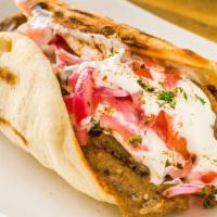 Gyro Pita Sandwich · Mixture of beef and lamb marinated in herbs and spices. Served in a pita with lettuce, tomat...