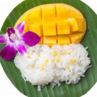 Thai Mango Sticky Rice · Sweet sticky rice and mangos in coconut pandan dressing.