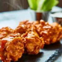 Buffalo Chicken Tenders · All white meat chicken tenders house breaded and tossed in choice of dry rub or sauce. Serve...